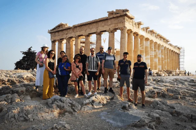 Some of the senior team standing in front of the Acropolis in Athens